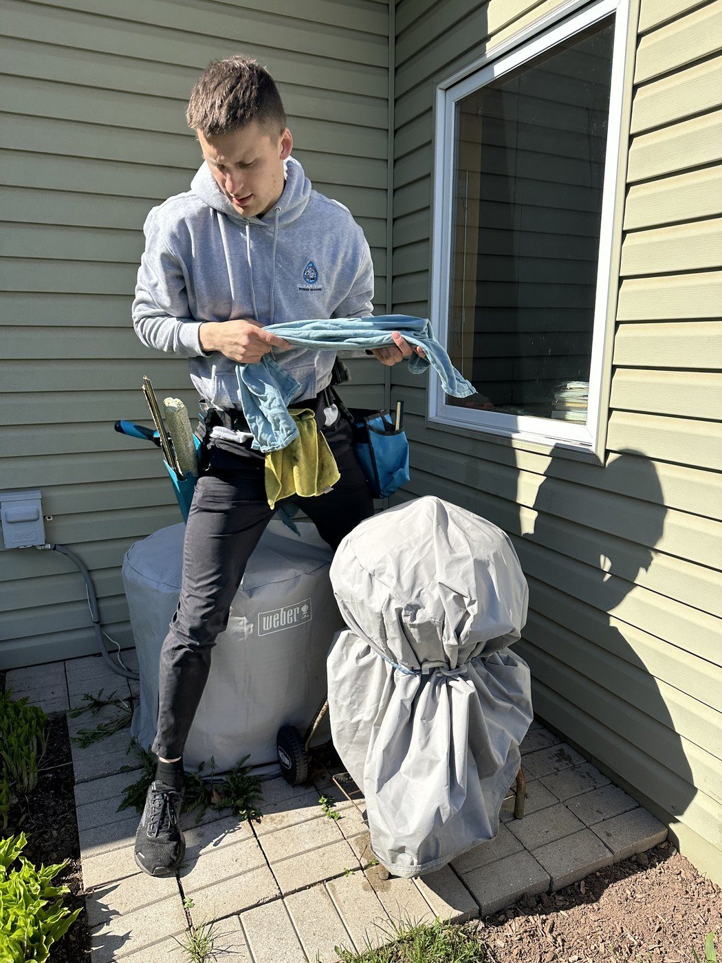 Crew member sorting wash towels between jobs