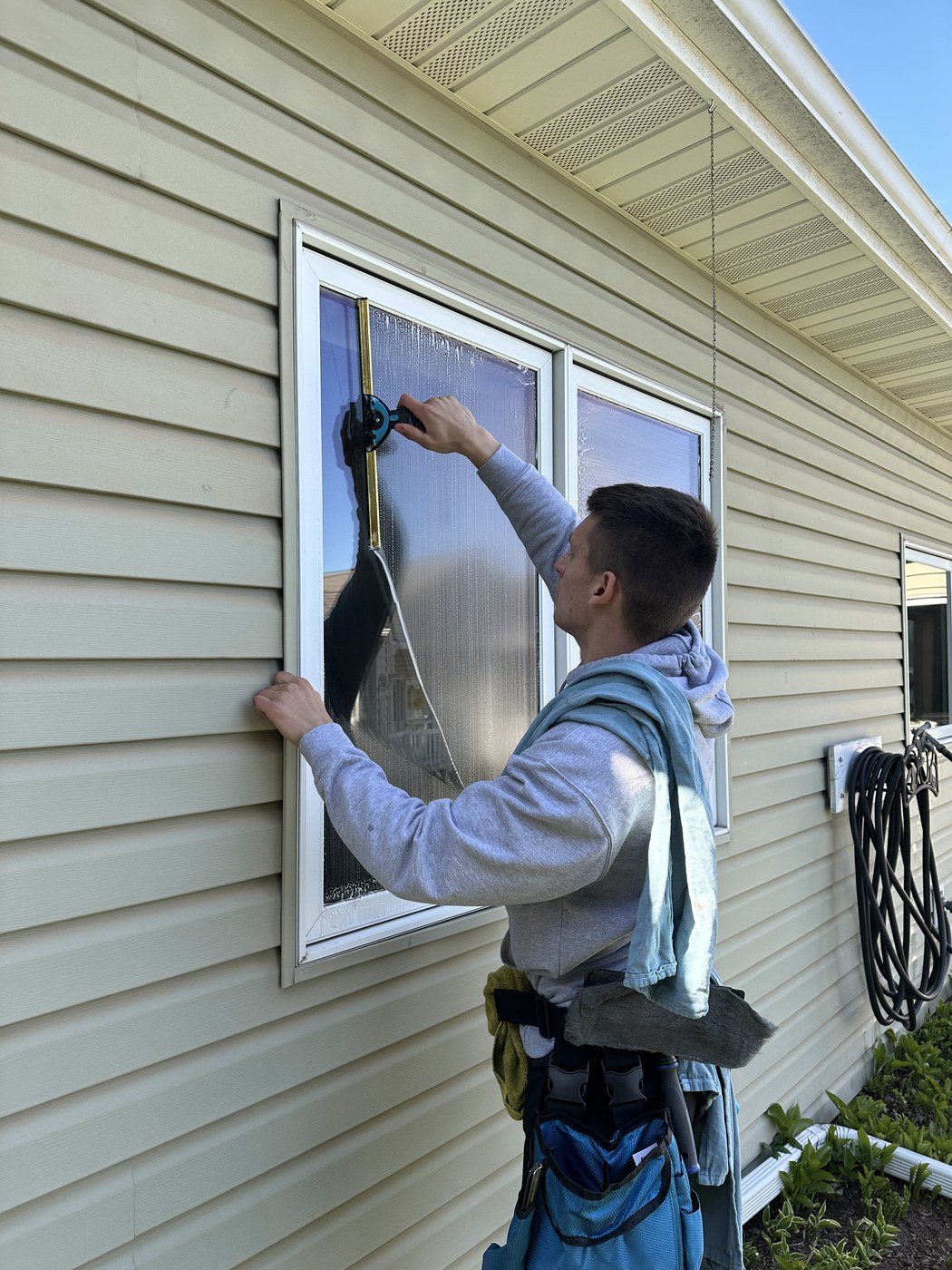 Clear Vue crew at work: squeegee toolbelt