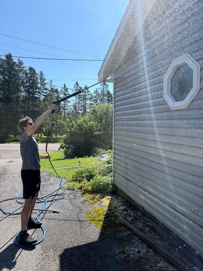 Clear Vue crew soft washing vinyl siding on a Minnesota home