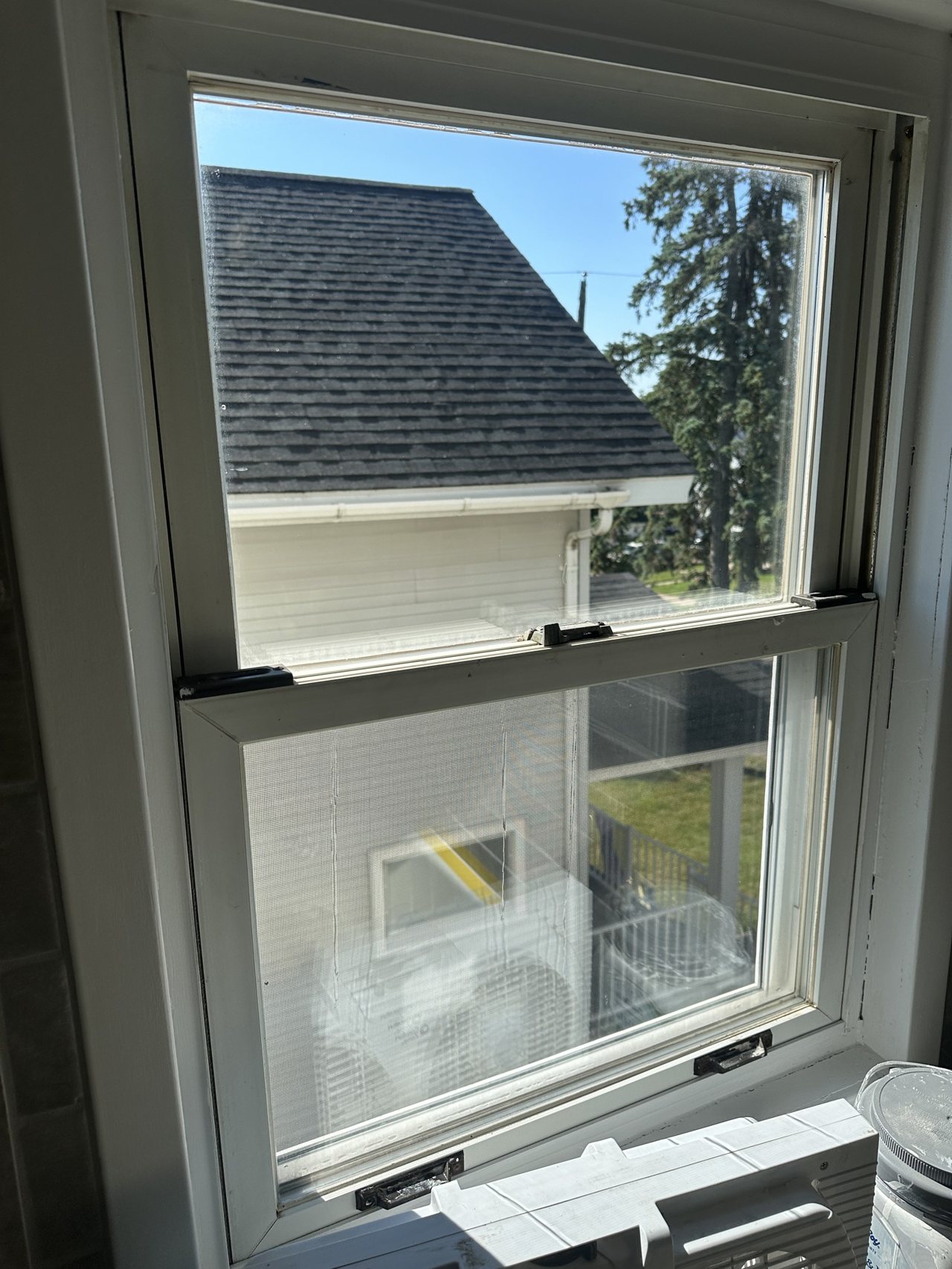 Interior view of a double-hung window during a Clear Vue interior cleaning